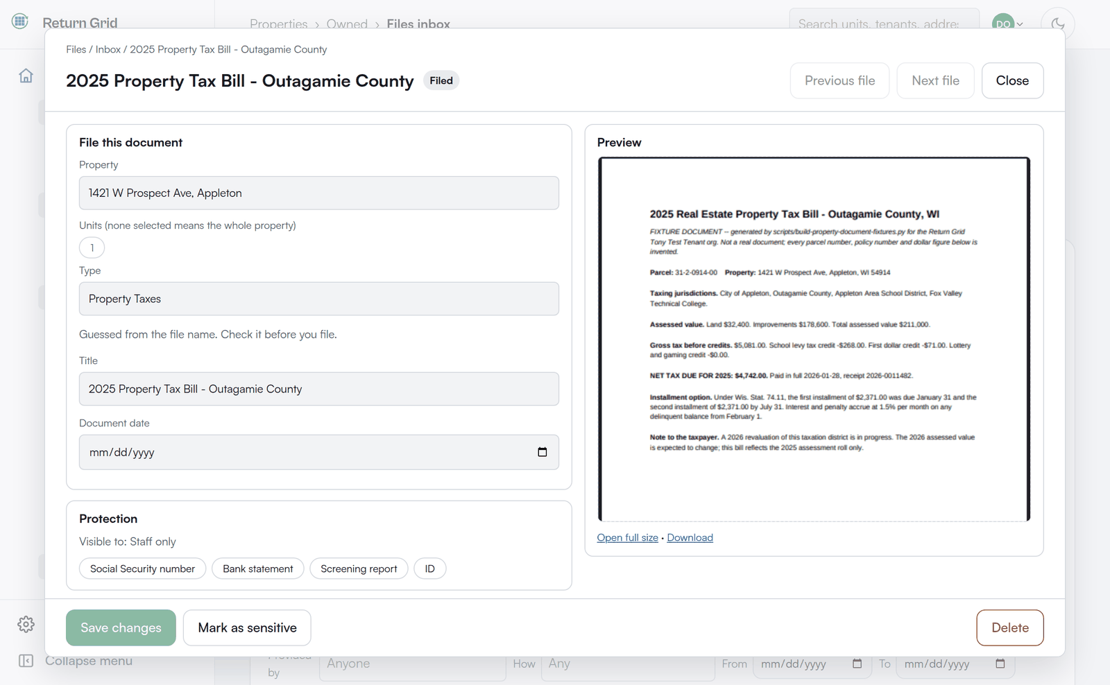 A file open in the Files inbox as a wide popup over the list: the File this document panel with the property and unit pickers, type, title and document date, a Protection panel with the sensitive options, and a preview of the file beside them.